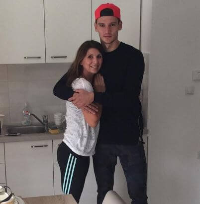Borna Barisic with his mother.